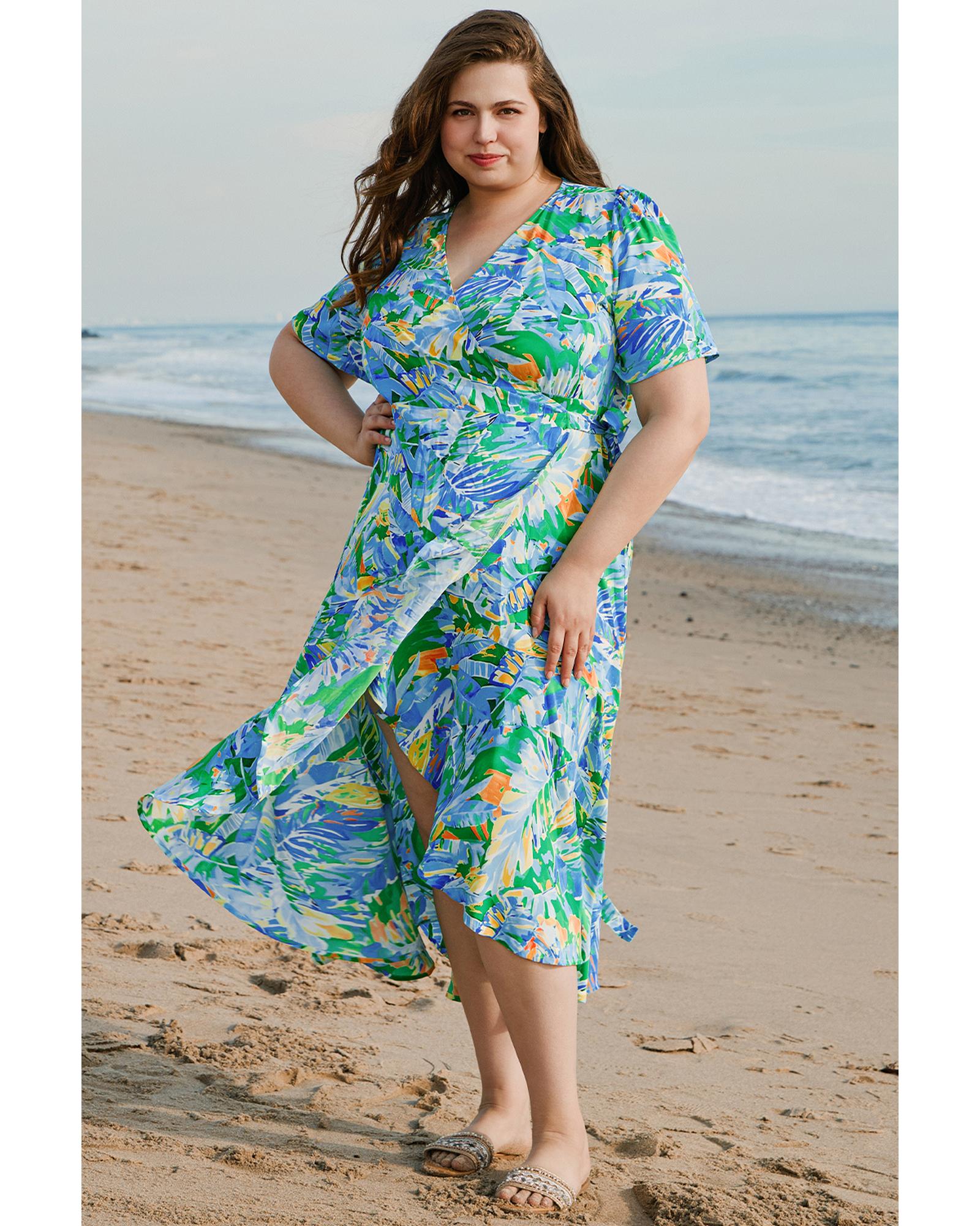 V539-AZEXPL612135-P920-1X-202506152321-00 Green Leaves Print Short Sleeve Surplice Neck Ruffled Trim Plus Size Maxi Dress - 1X - Image 1