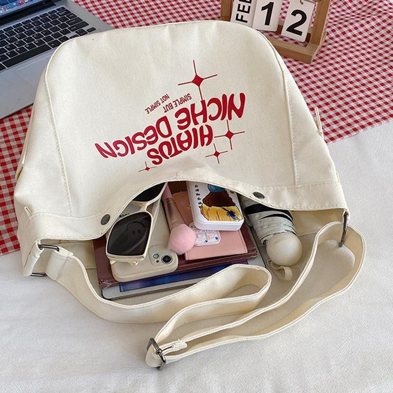 V562-B1096484060DBT-202505201313-05 Printed Letter Canvas Tote For Women Spacious & Casual - Khaki - Image 6