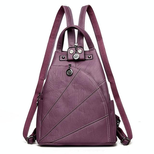 V562-D1057901910DBT-202505271320-00 Women Leather Backpack - Secure & Stylish - Purple - Image 1
