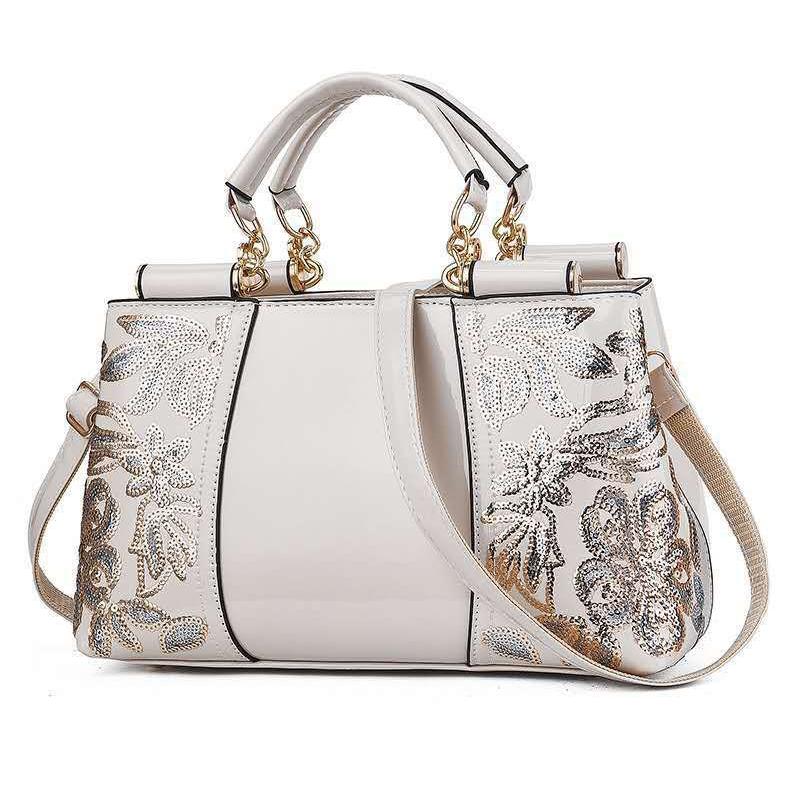V562-D1088132060DBT-202503041335-09 Shiny Leather Handbag with Single-sided Embroidery - Rice-White - Image 10