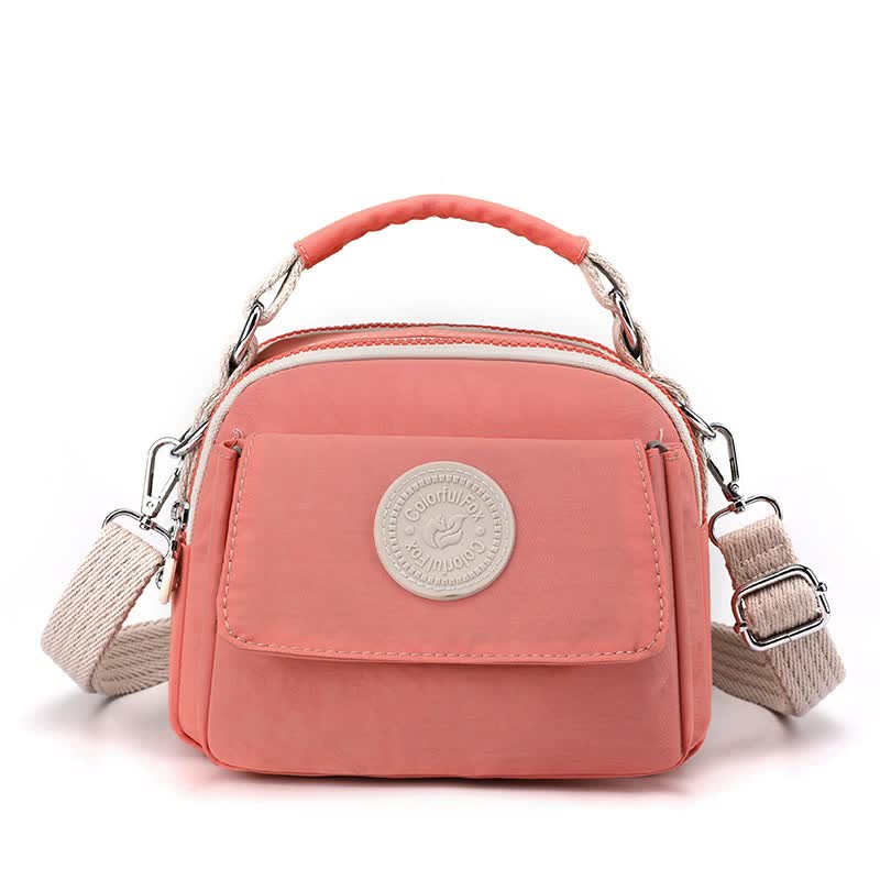 V888-ELOSUNG15512-214174-00 Pink Compact Nylon Crossbody Bag - Stylish and Versatile Shoulder Purse - Image 1
