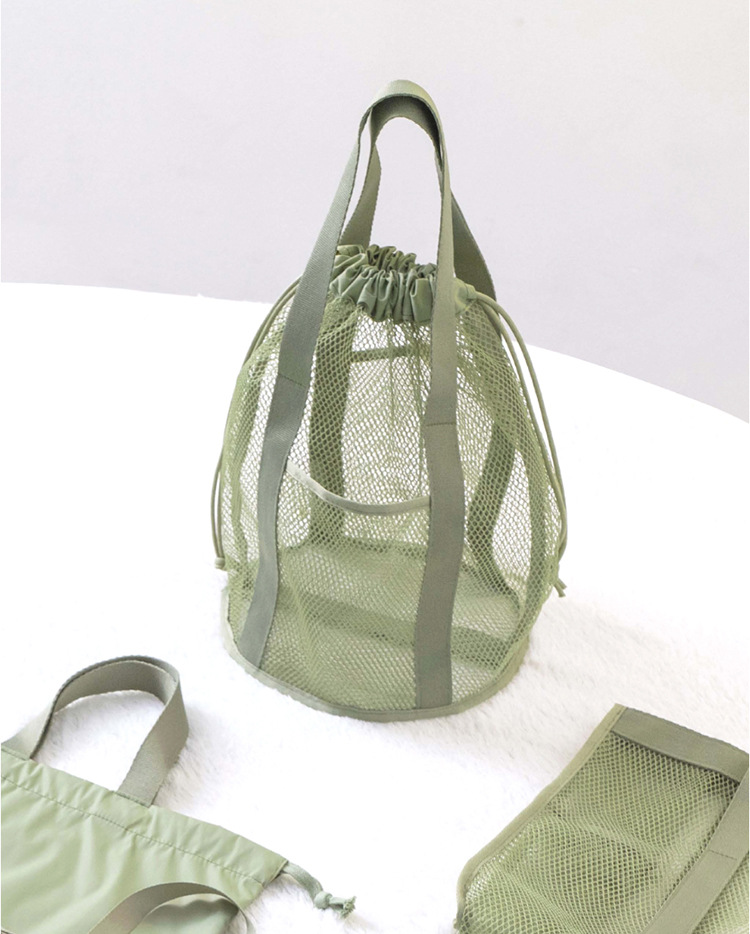 V888-ELOSUNG21922-202503141126-00 Green Lightweight Mesh Drawstring Beach Bag - Portable Travel Organizer for Toiletries and Essentials - Image 1