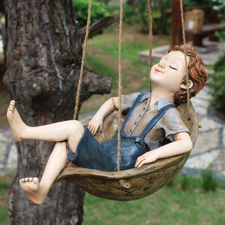 V888-ELOSUNG24597-202504141712-00 Walnut Boy Swing Resin Ornament - 20.5x11x12.5cm Charming Garden Hanging Decor for Trees & Patios - Image 1