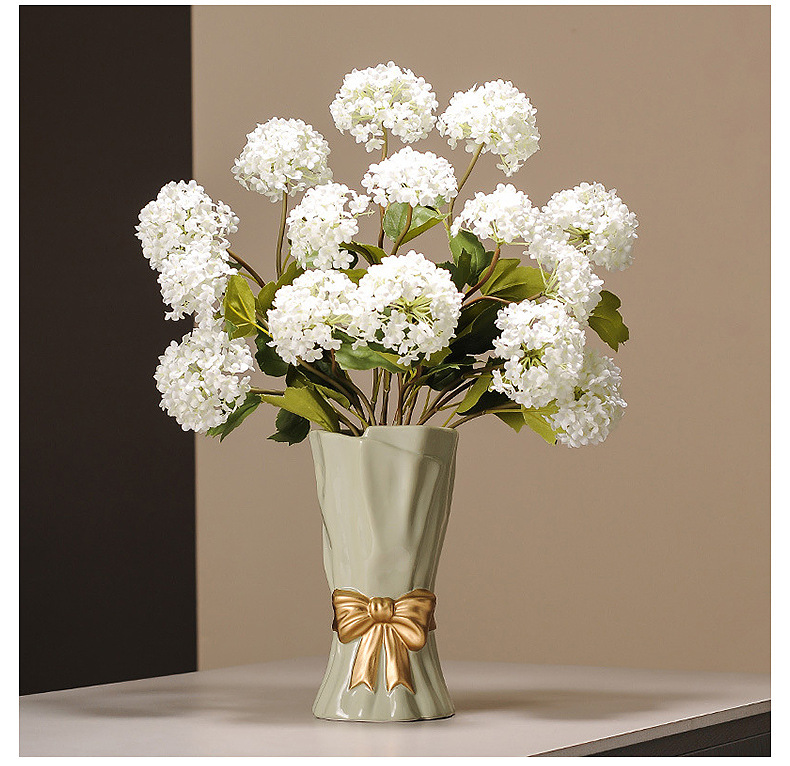 V888-ELOSUNG27750-202505191336-02 Beige Elegant Ceramic Vase with Golden Bow Accent - Textured Relief Flower Holder for Living Room & Dining Table Decor - Image 3